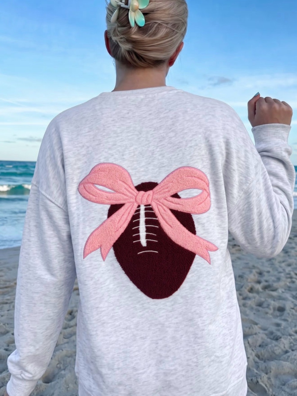 Women’s Light Gray Sweatshirt with Pink Bow Football Appliqué